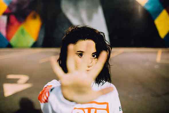  A woman reaching for the camera